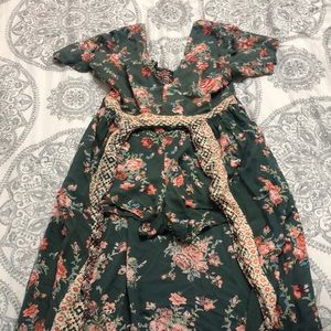 Romper with shorts and long cape.